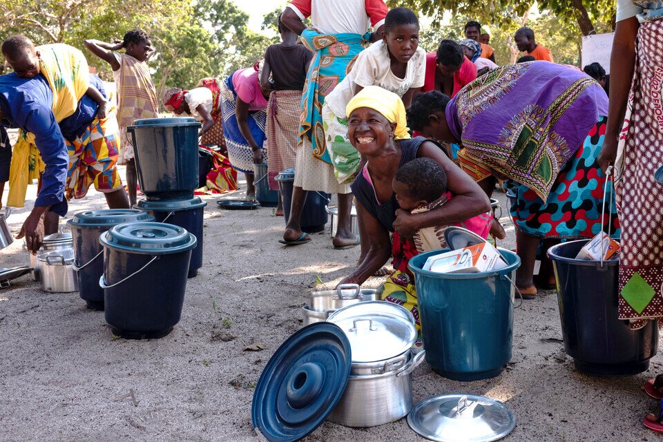 People receiving hygiene kits from Oxfam